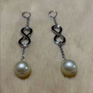 3 1/2” infinity sign and pearl earrings.